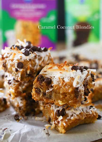 Caramel Coconut Blondies, a yummy bar recipe loaded with butterscotch & chocolate & topped with a layer of caramel, toasted coconut & more chocolate chips.