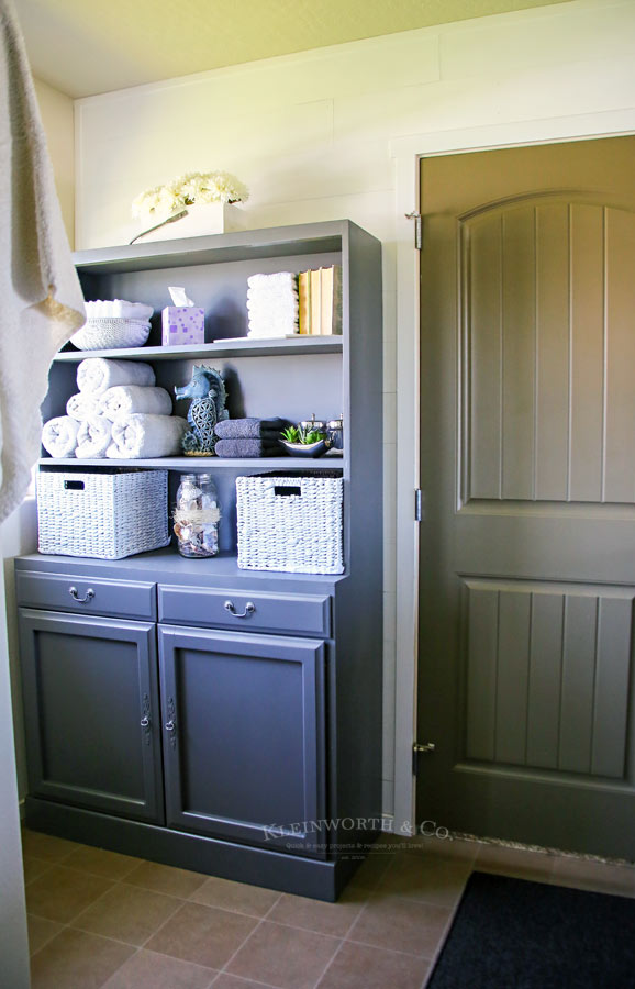 Master Bath Mini Budget Makeover hutch as towel storage