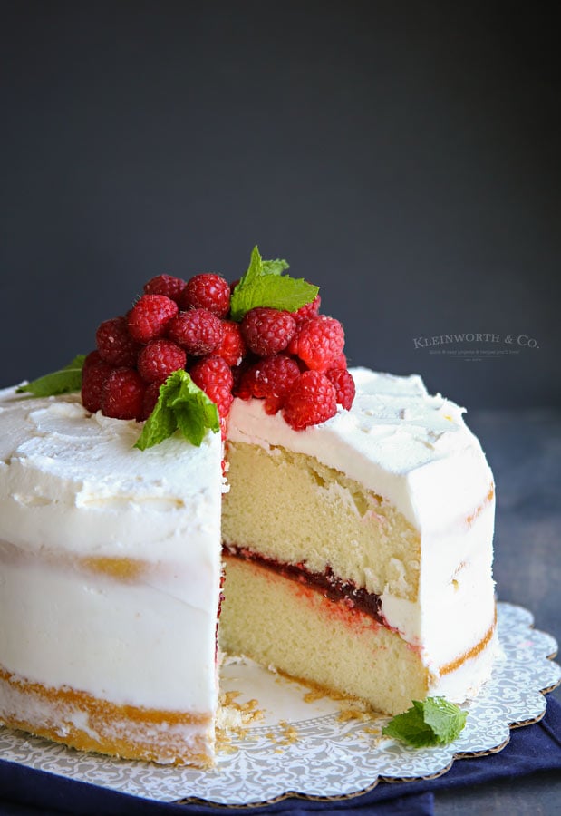 Best Bakery Buttercream Frosting on white cake with raspberry filling