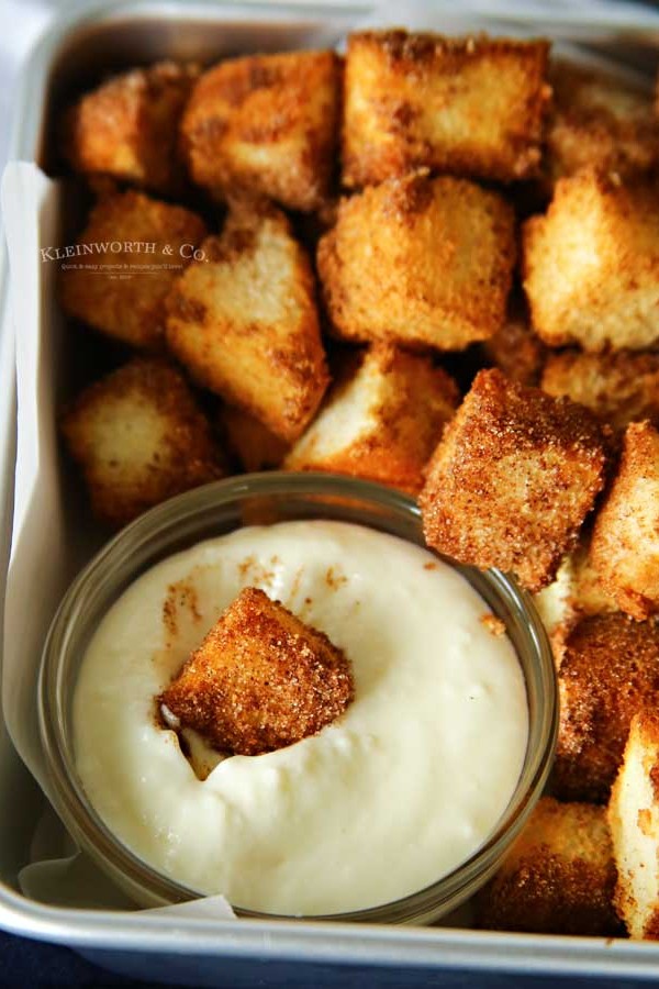Air Fryer Angel Food Cake Churro Bites with cream cheese dipping sauce