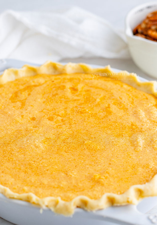 pumpkin pie filled before baking