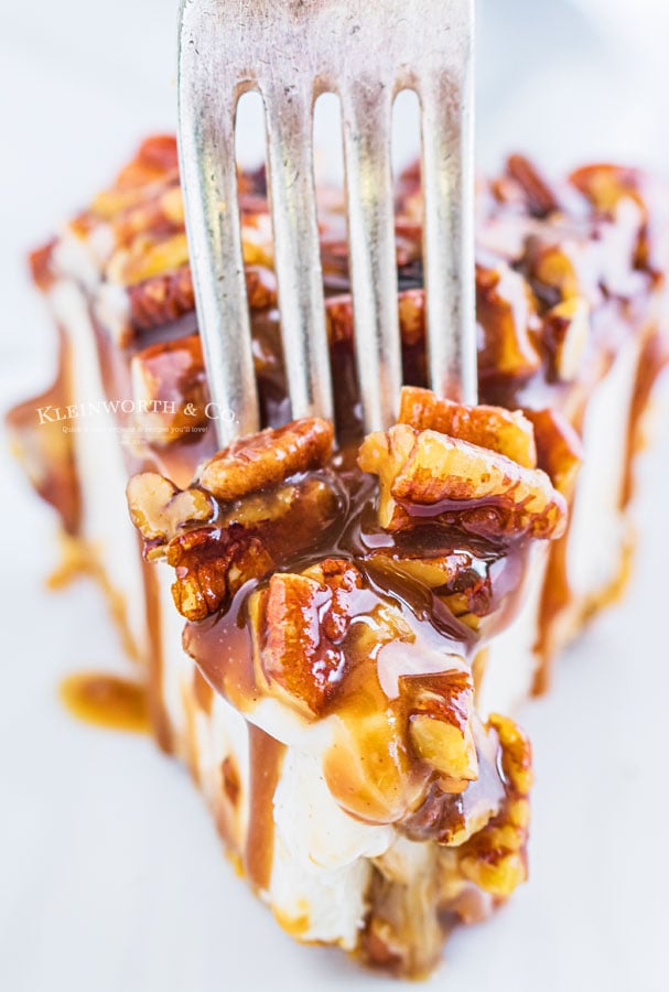 pecan cheesecake with a fork