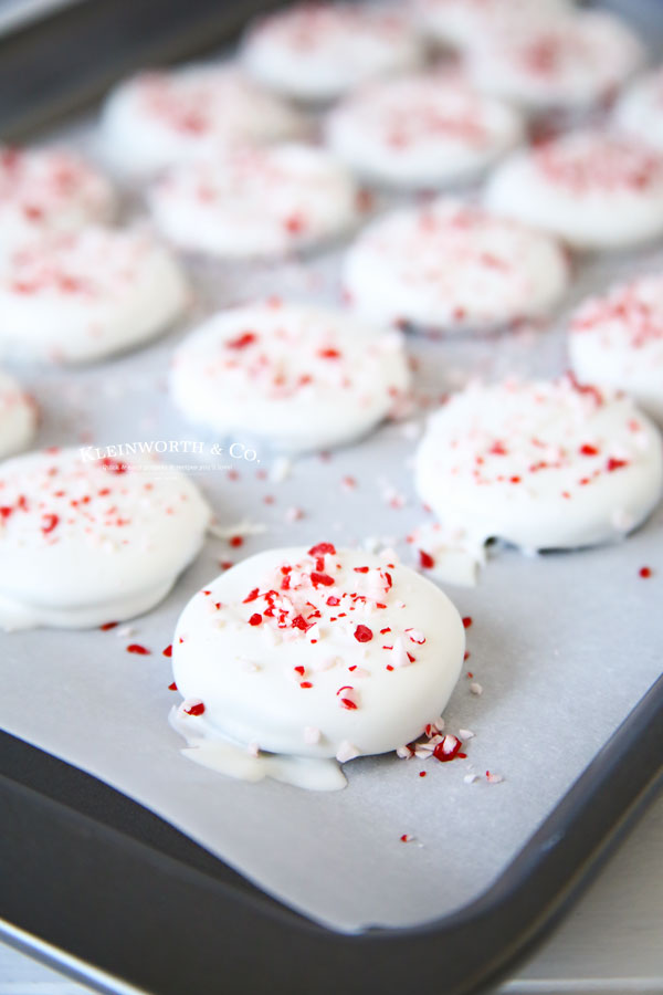 adding the crushed peppermint to the cookies