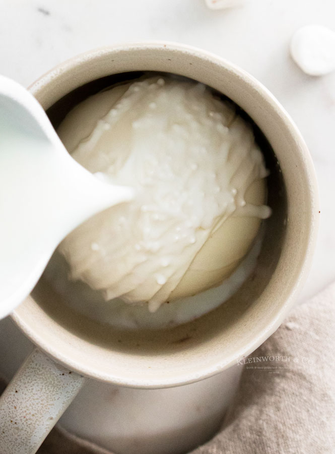 Making White Chocolate Hot Cocoa Bombs with milk