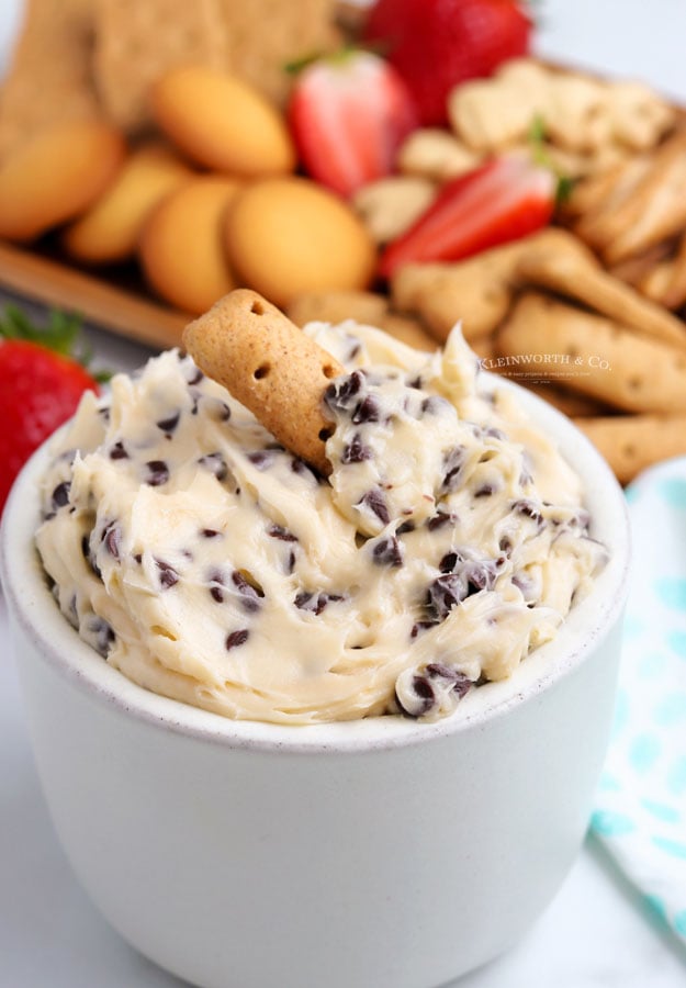 dipping Cookie Dough Dip with a cookie