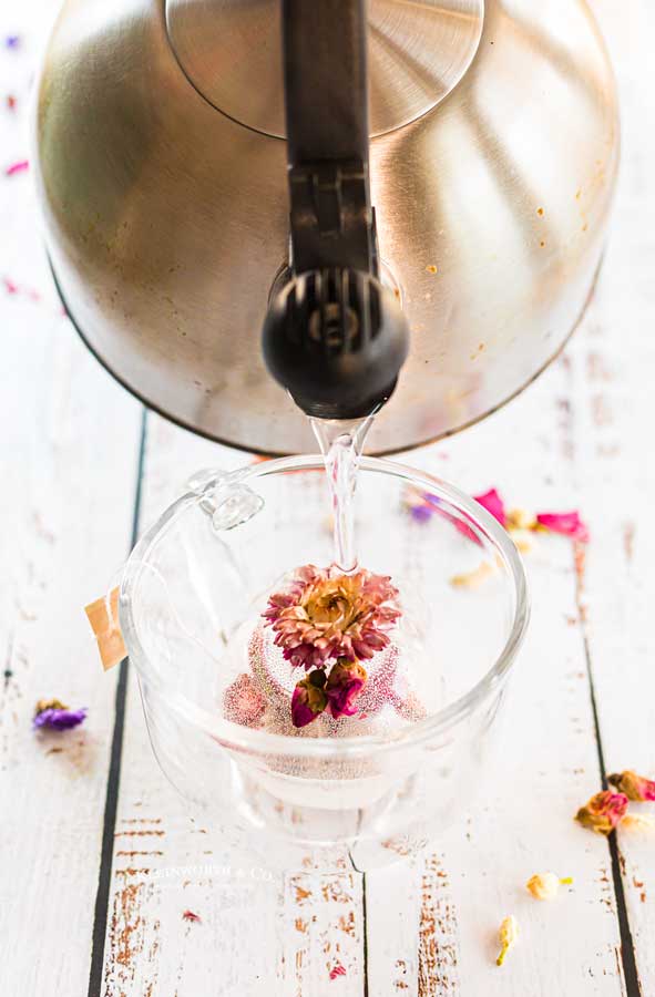 pouring water on tea bomb