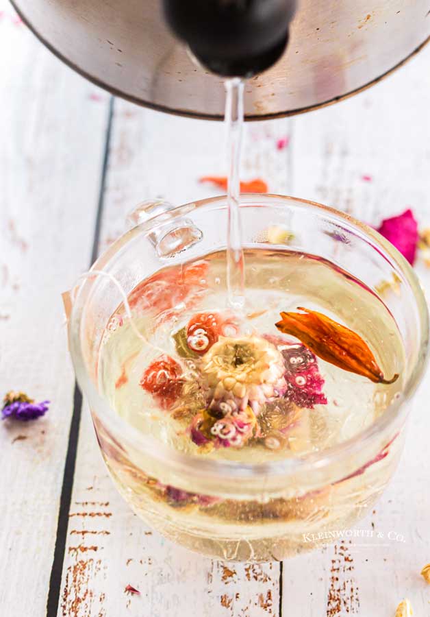 pouring floral tea