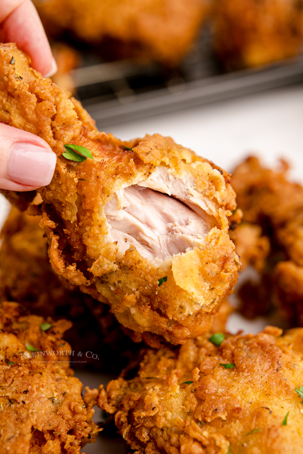 bite of fried chicken