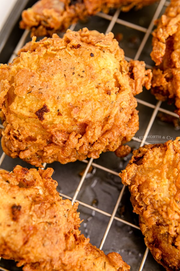 cooked chicken on drying rack