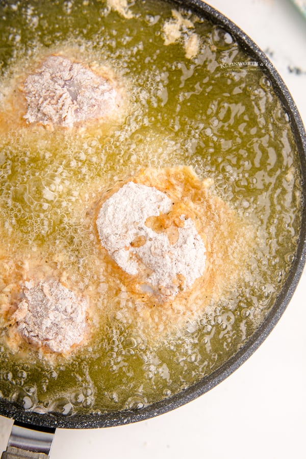 chicken frying in oil