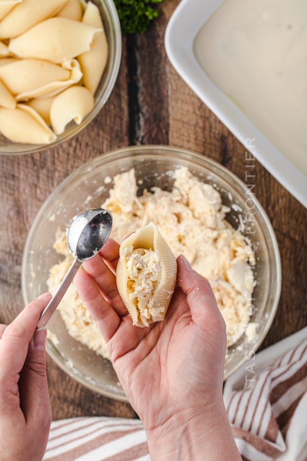 adding the filling - stuffed shells