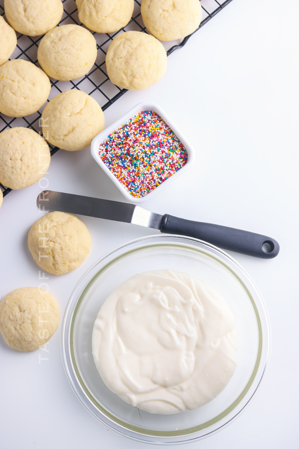 adding frosting for Ricotta Cookies