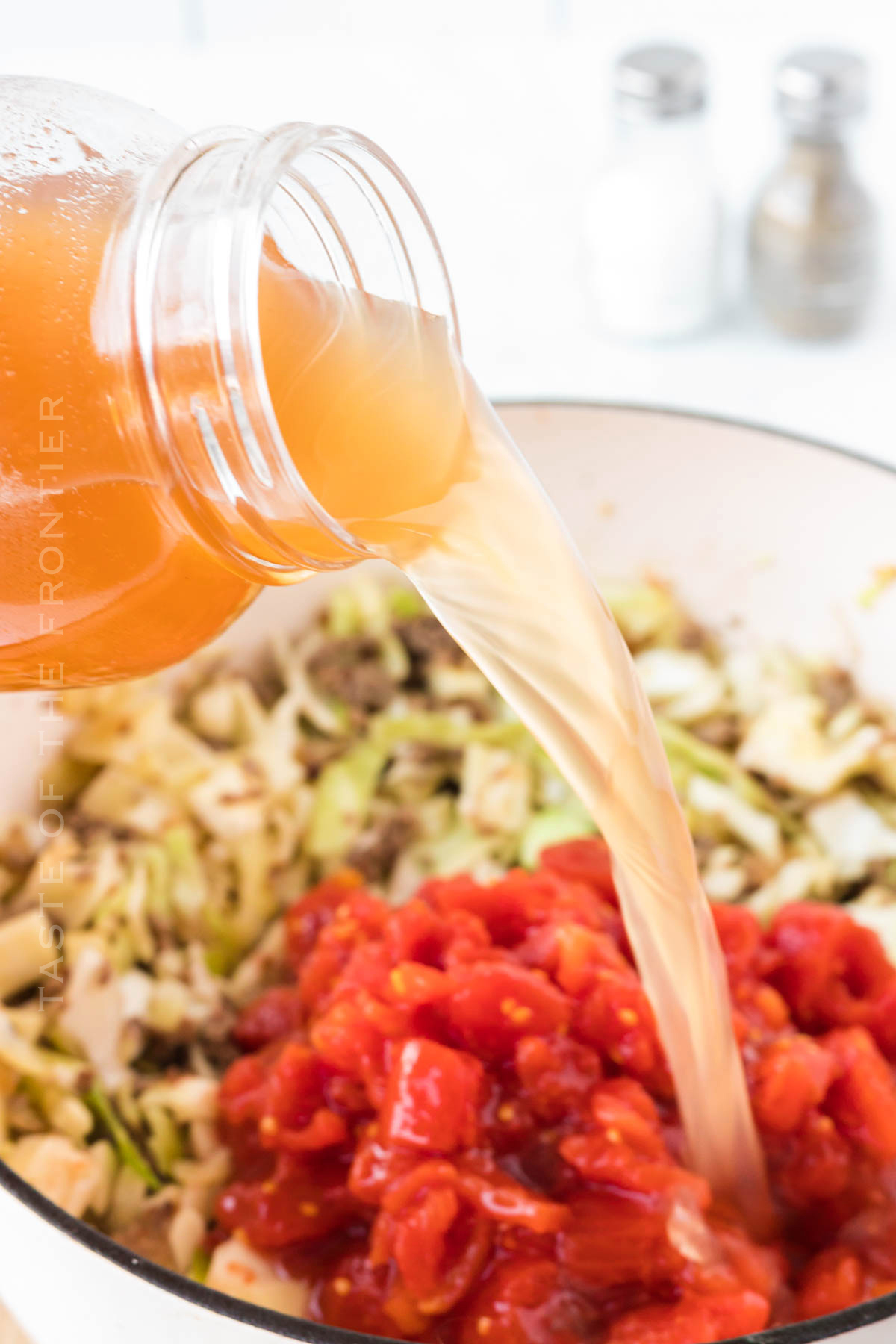 pouring in the broth- cabbage soup