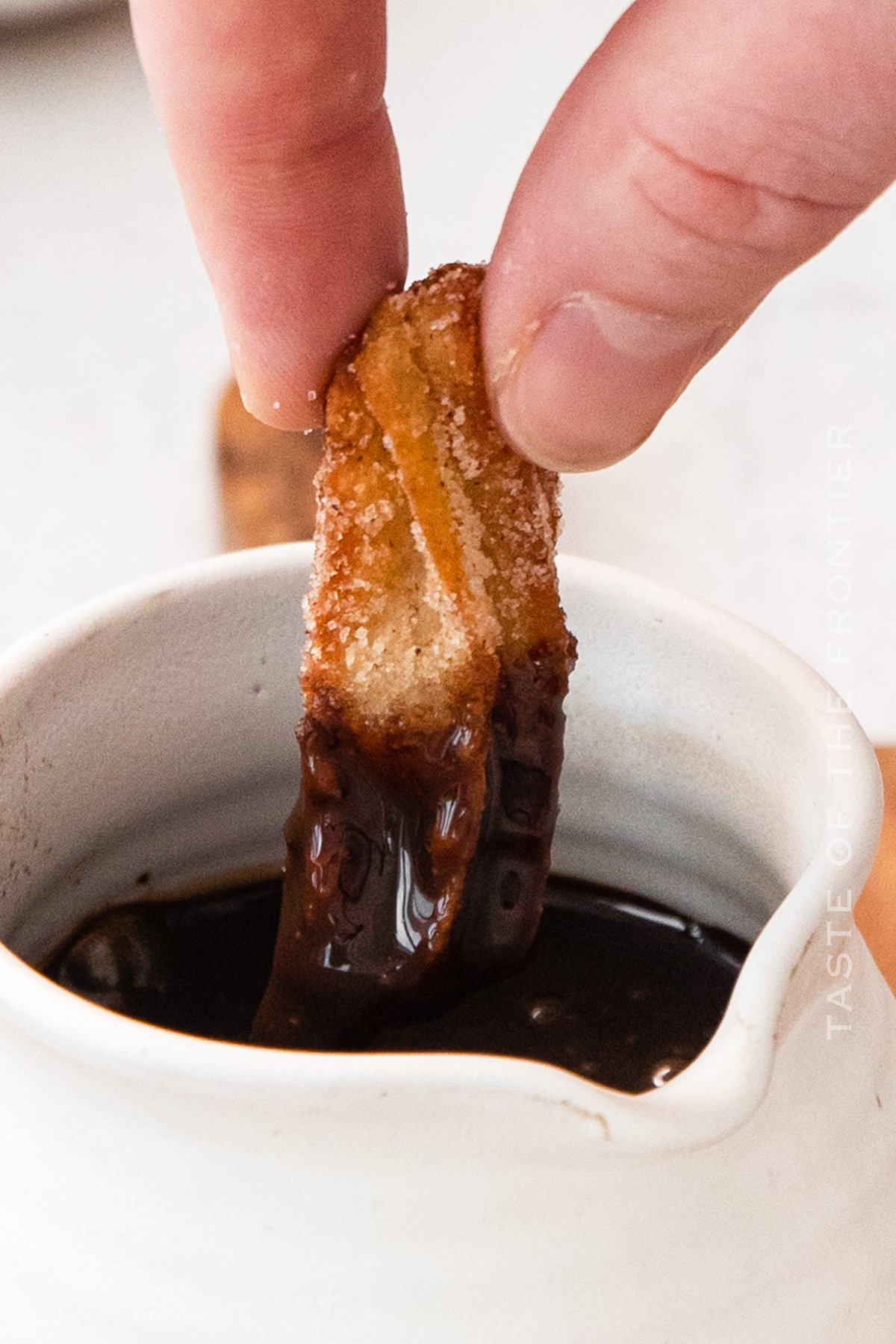 Churro with chocolate sauce