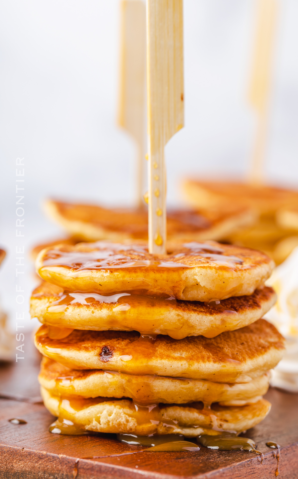 stack of banana pancakes with caramel