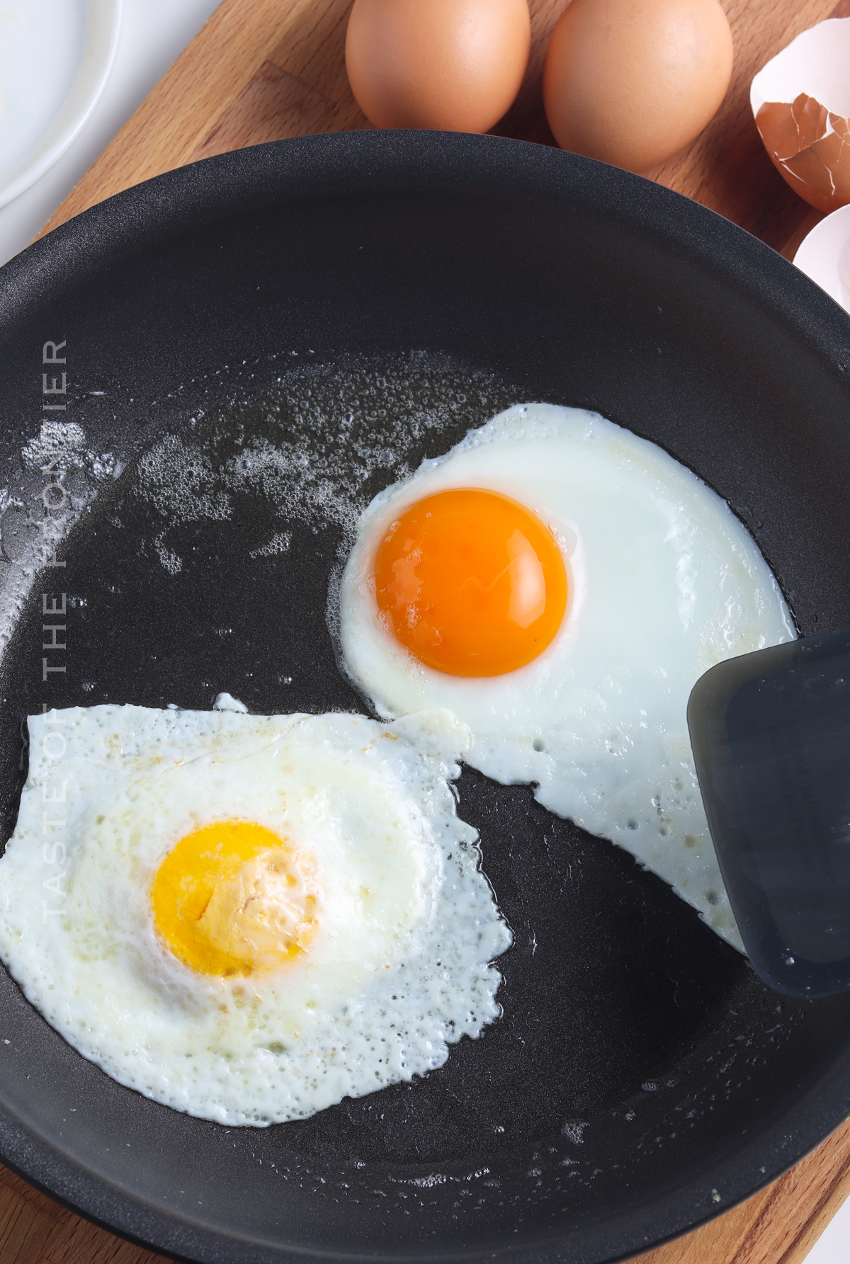 flipping fried eggs