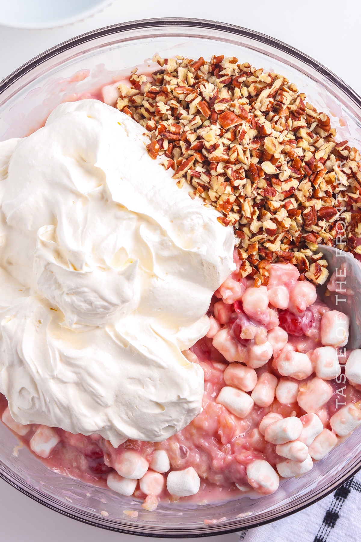 whipped cream, nuts and marshmallows