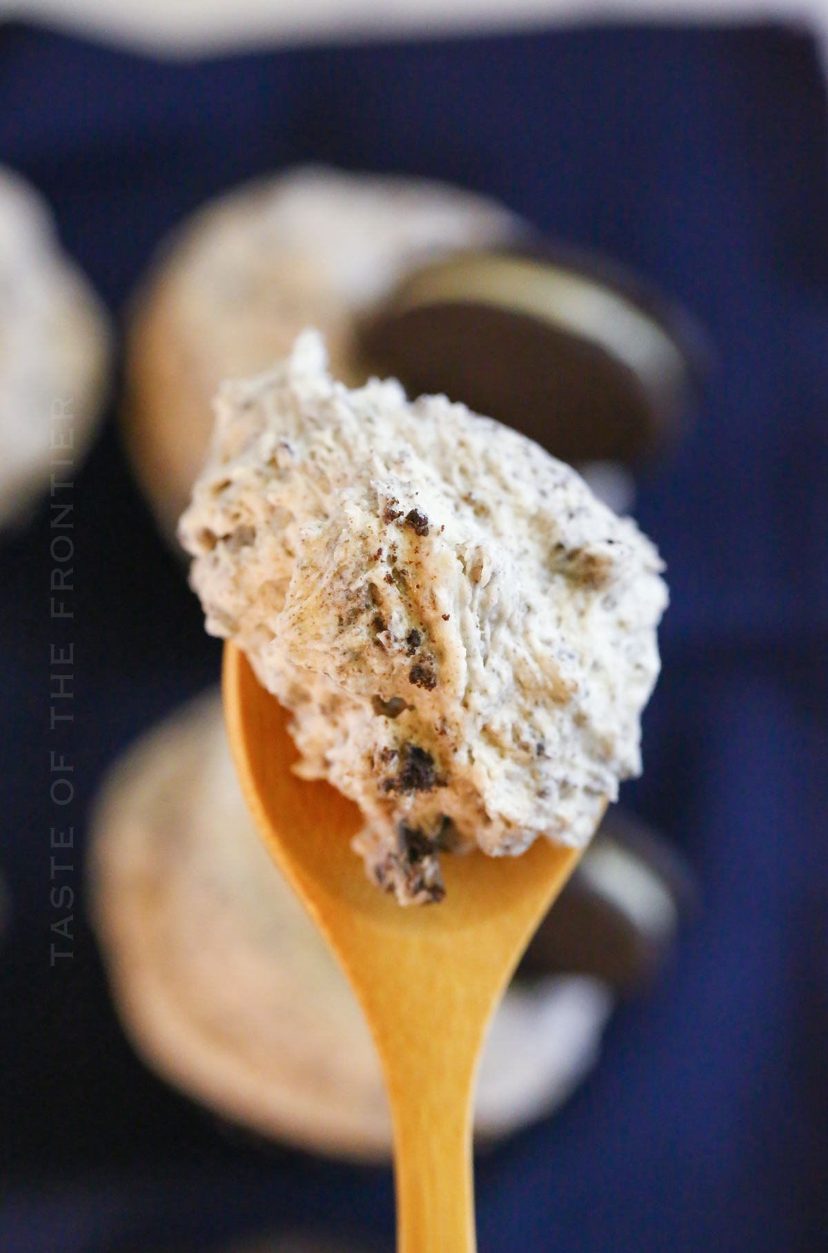 scoop of frosting with Oreo cookies