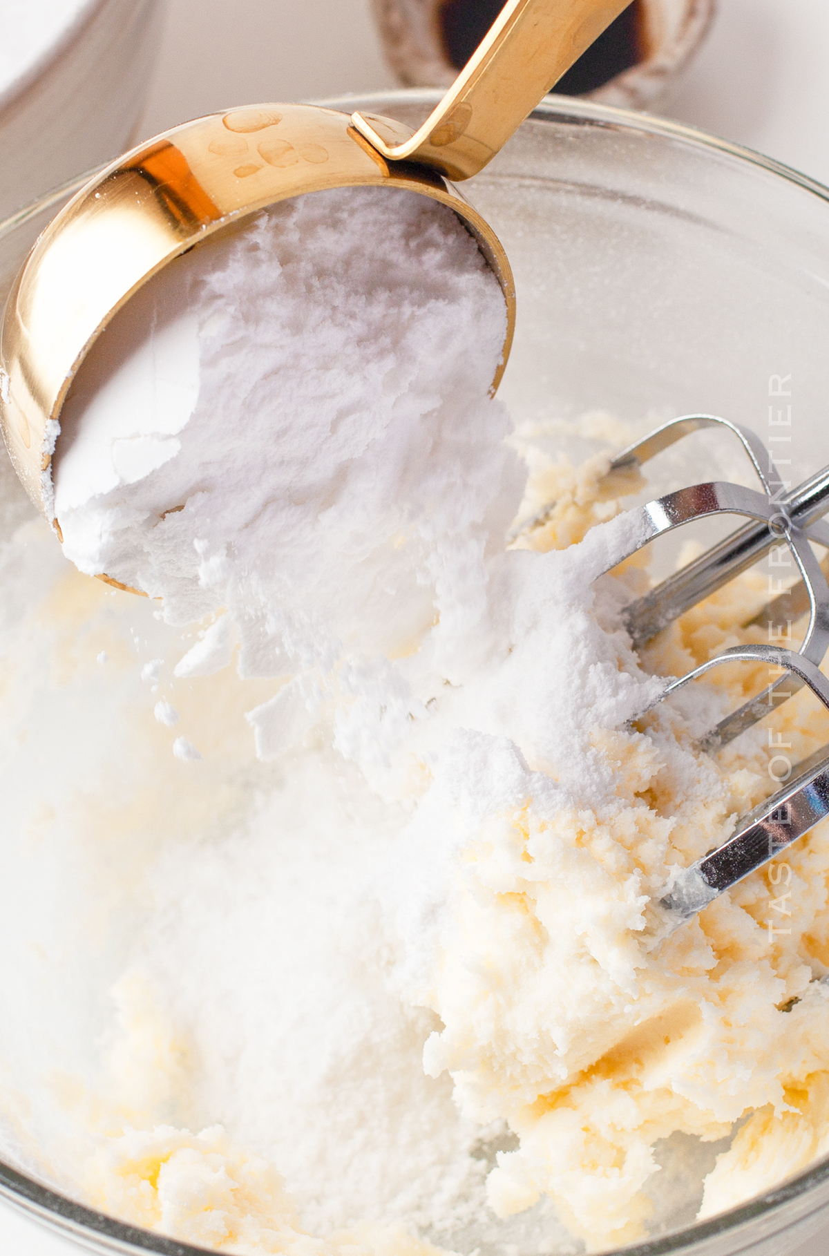 making frosting with sprinkles