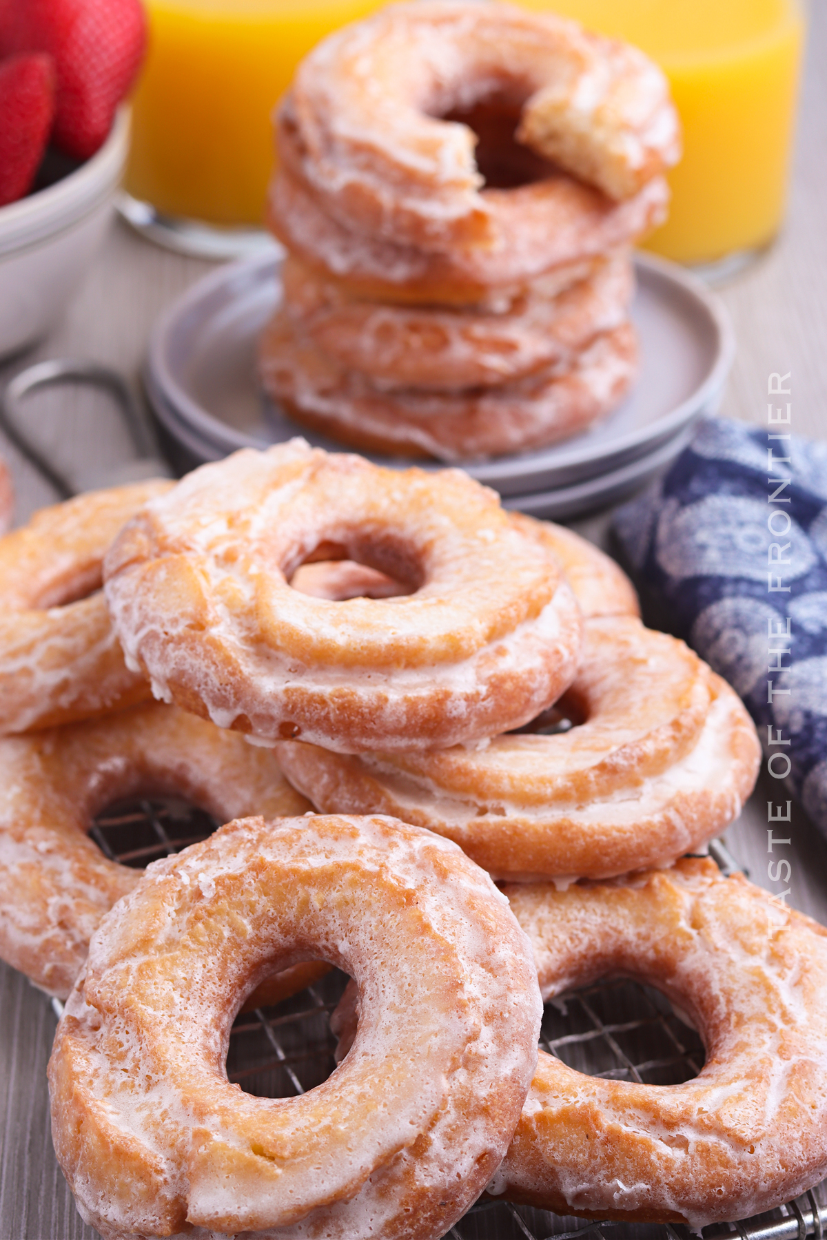 plate of glazed donuts