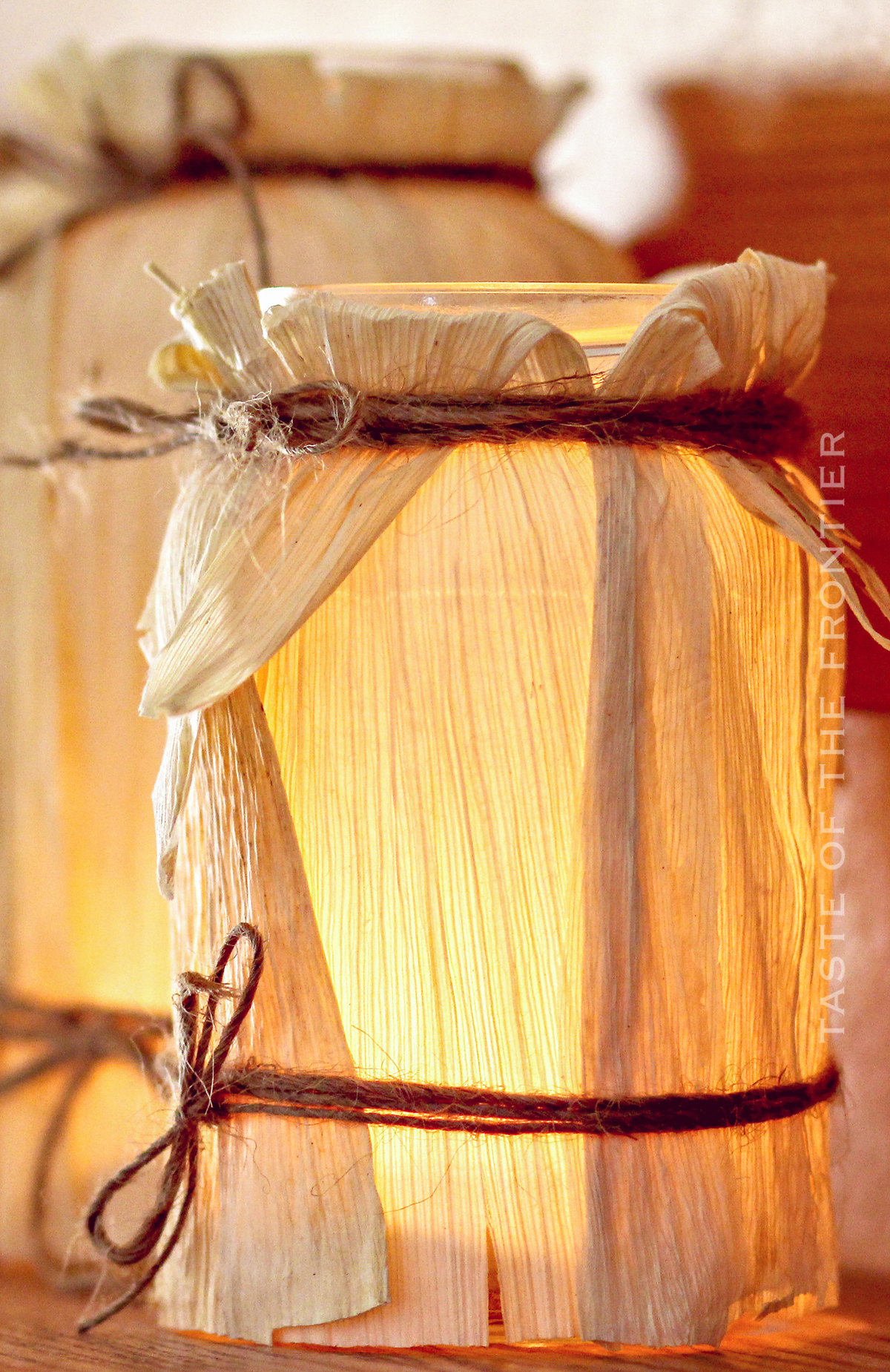 candle in Corn Husk Luminaries