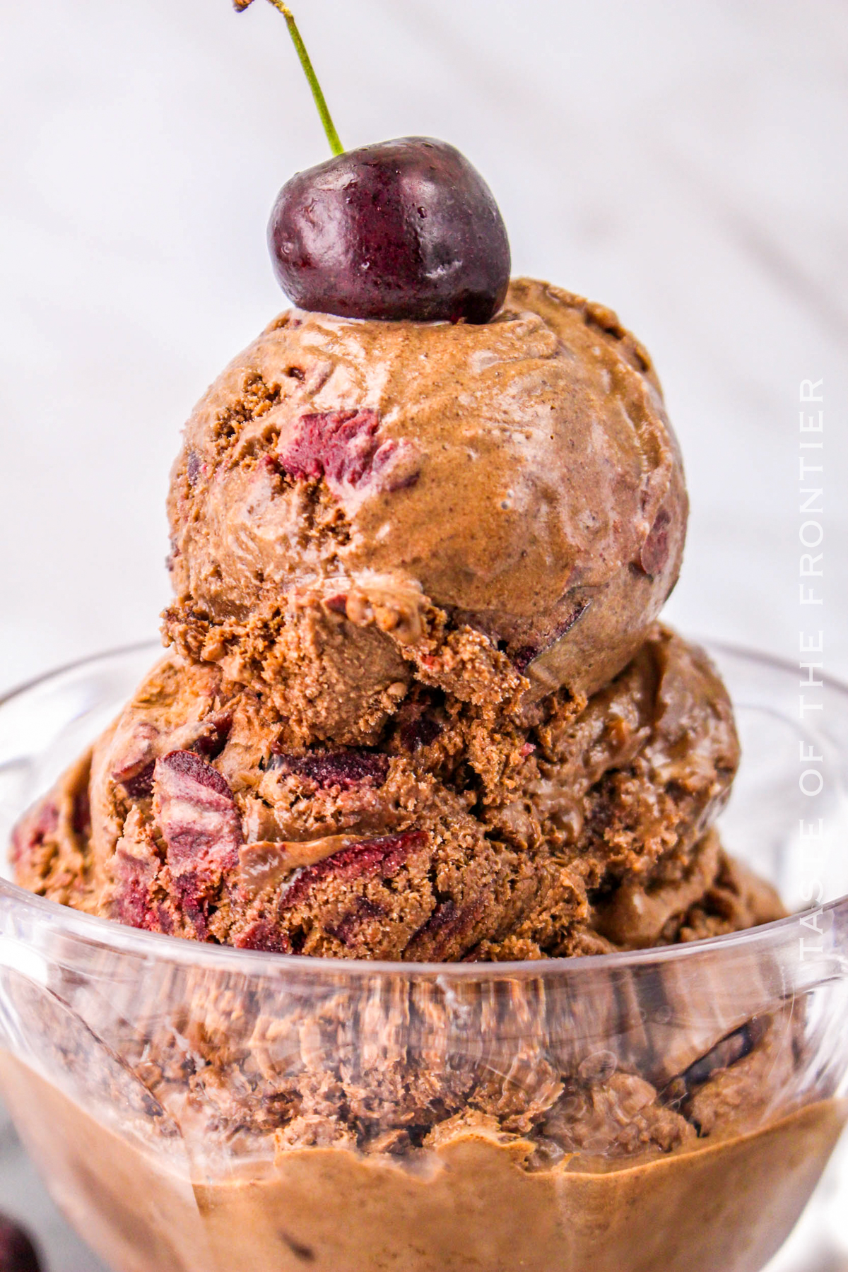 chocolate ice cream sundae with cherries