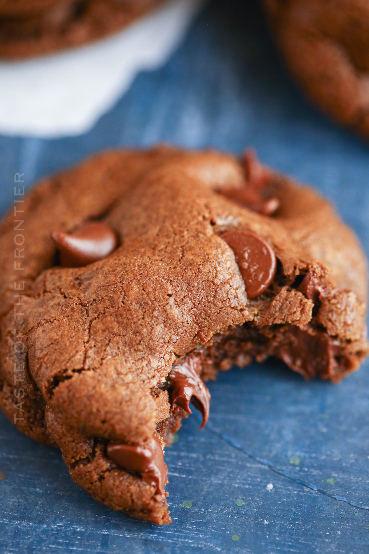 chocolate cookie missing a bite