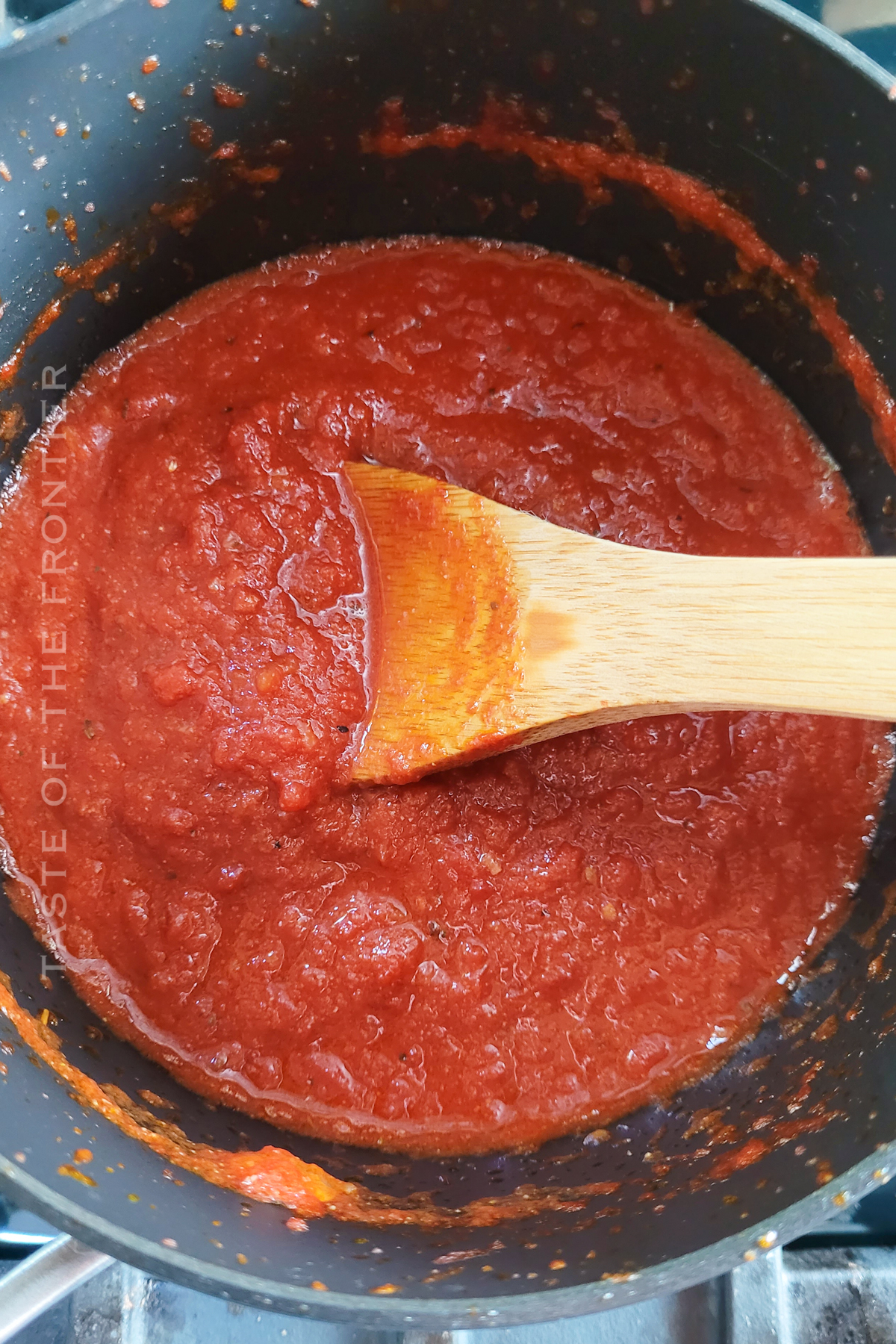 Simmer tomato sauce