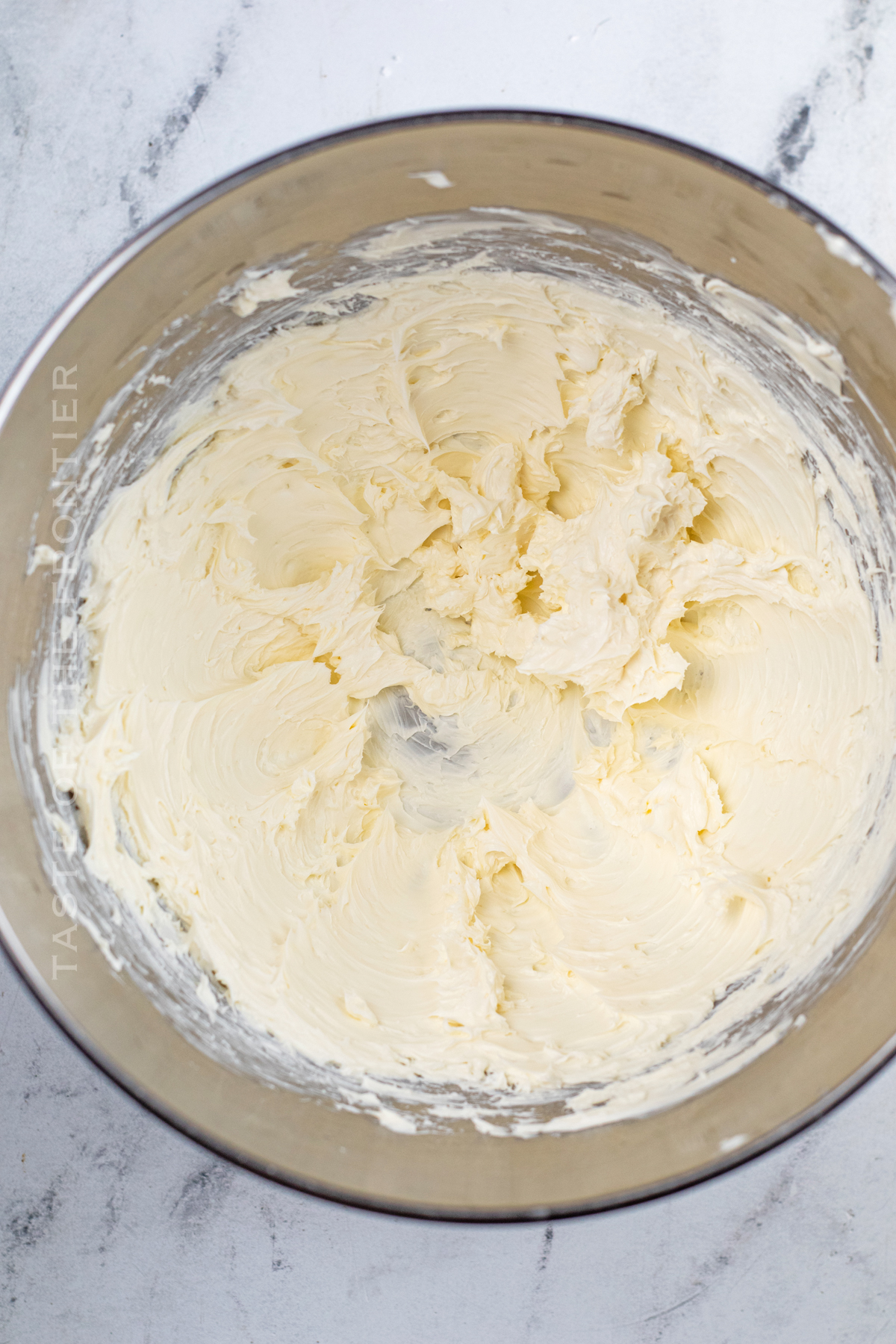 beating the cream cheese