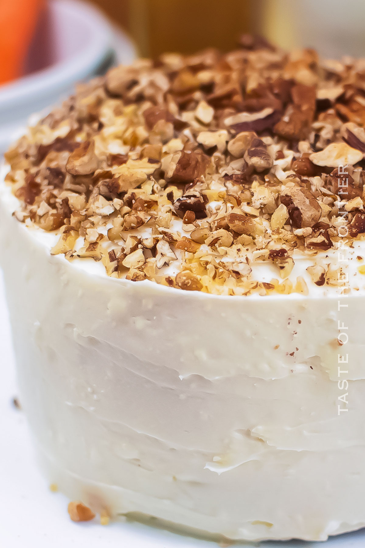 Carrot Cake topped with nuts