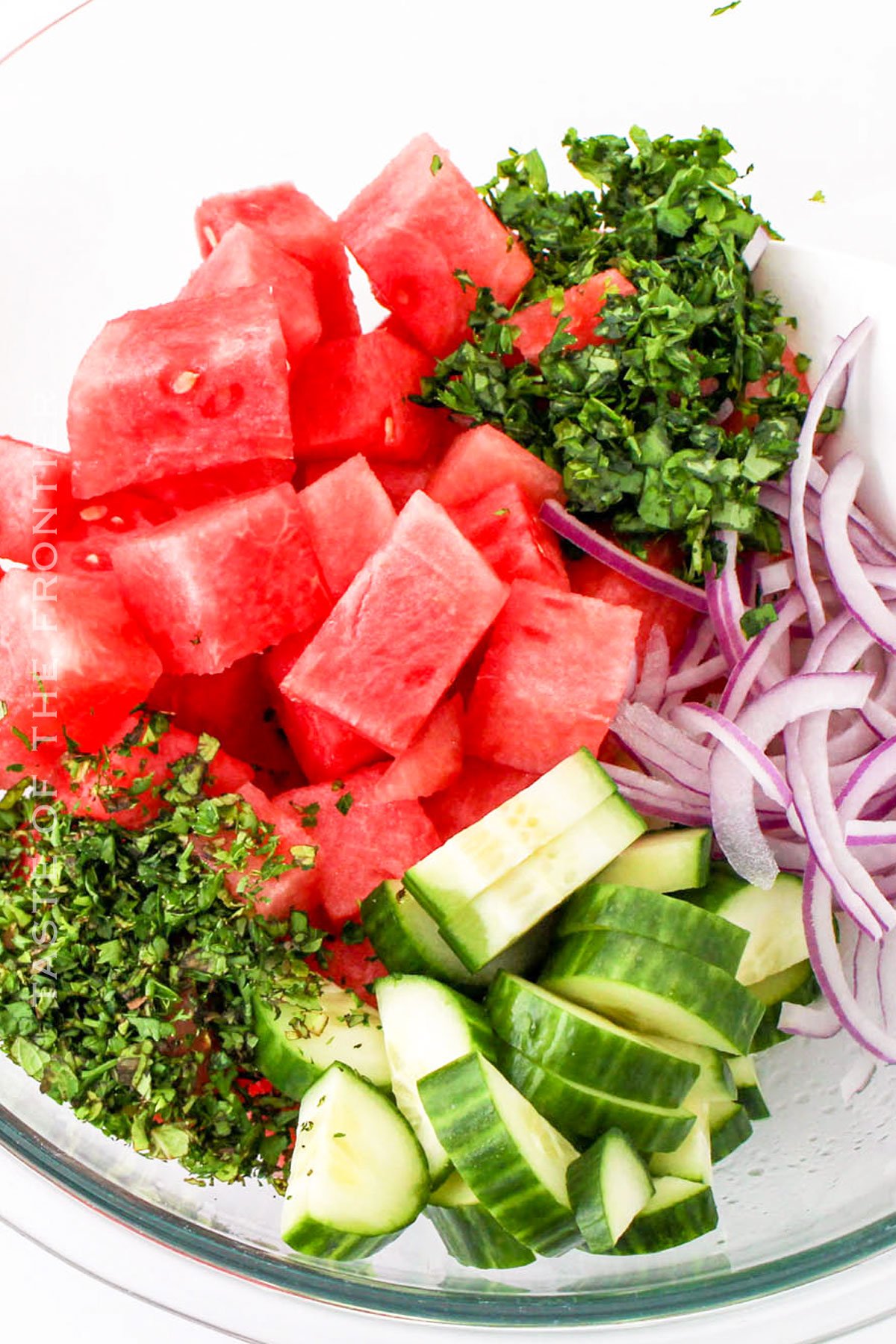 mixing the salad ingredients