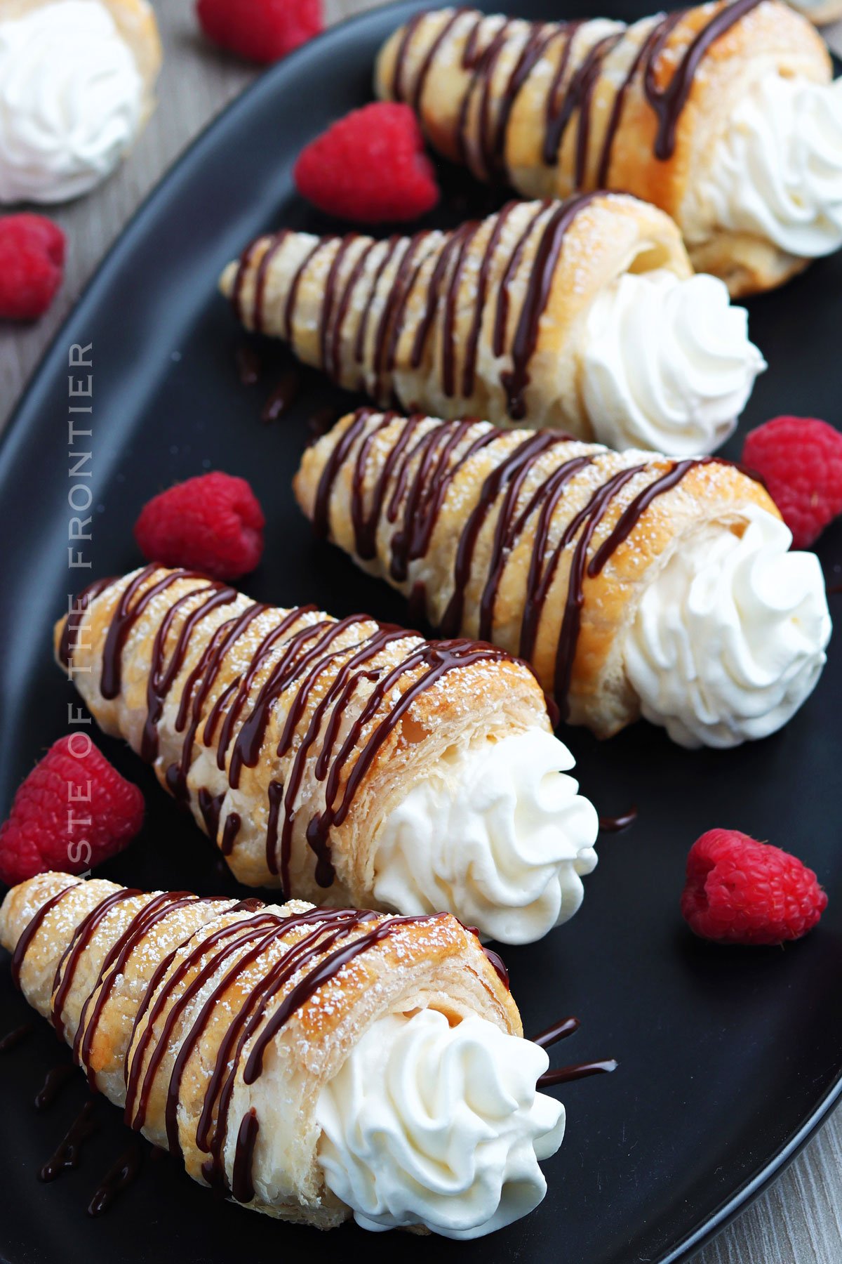 whipped cream filled pastries with chocolate