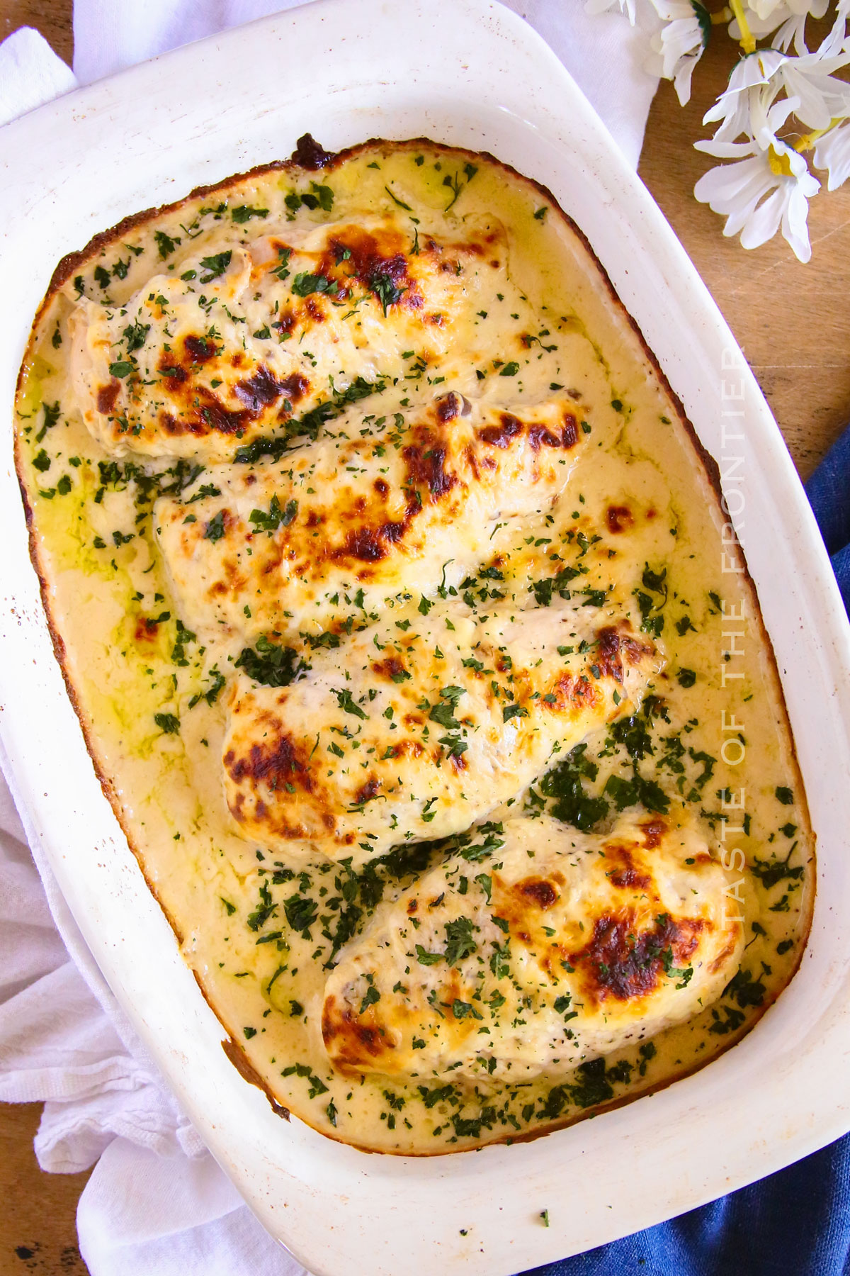 easy baked chicken in cheesy sauce