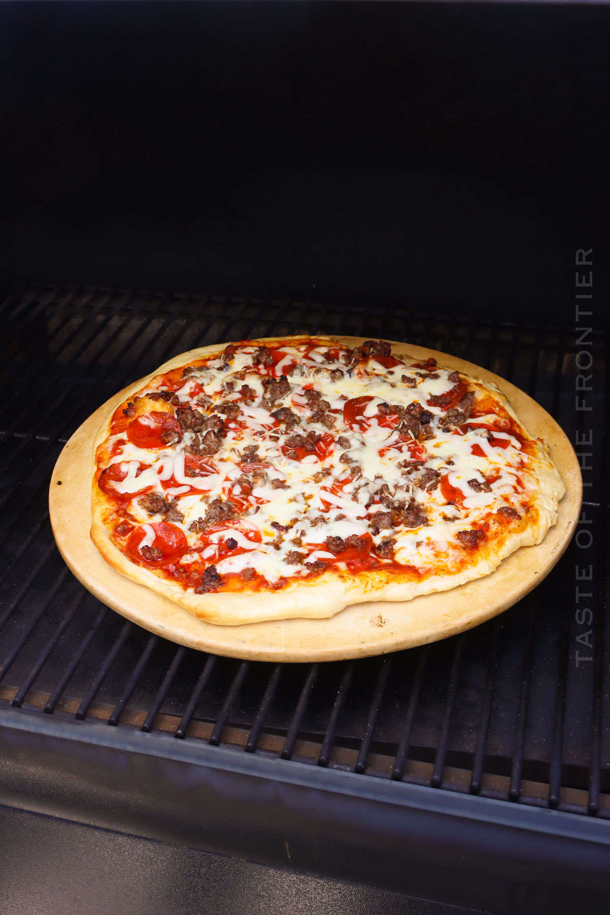 cooking pizza on the smoker
