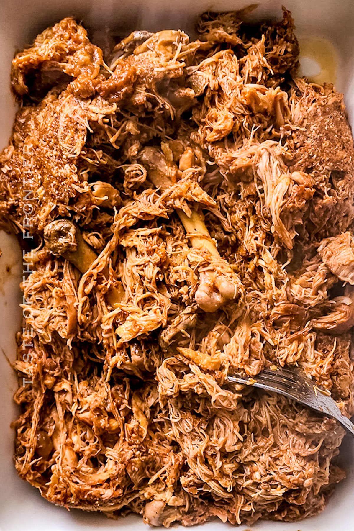 spicy shredded cooked chicken