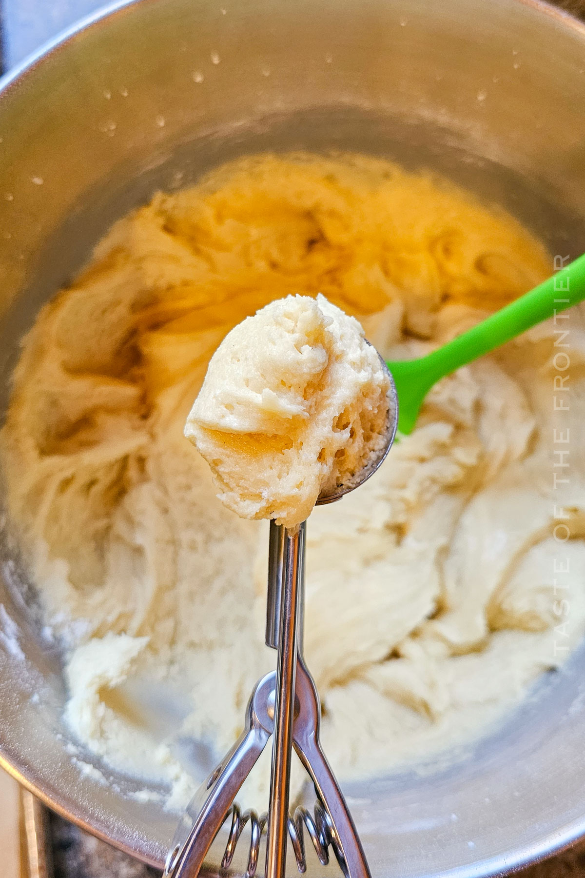 scooping cookie dough