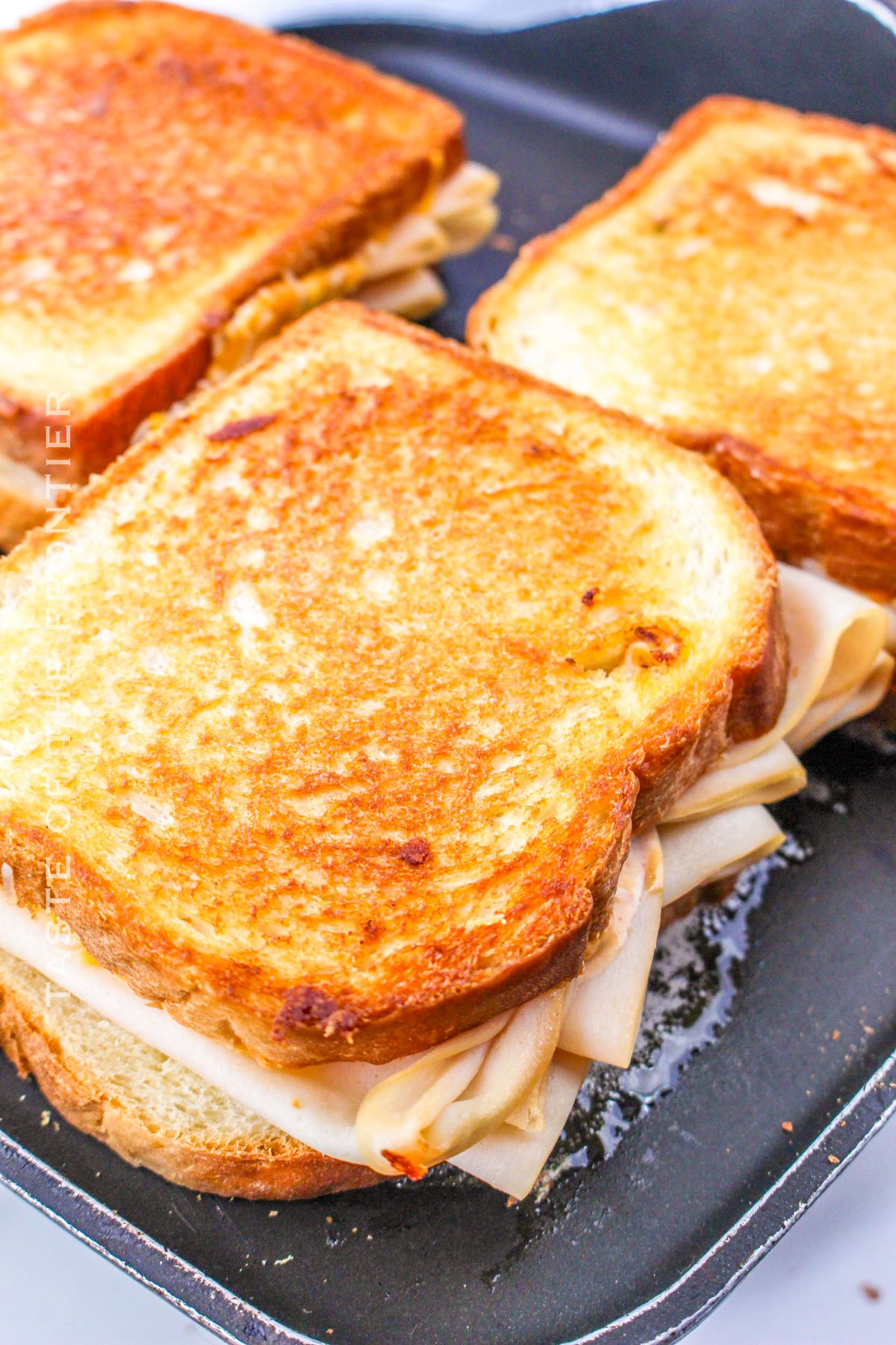 making grilled sandwiches on the griddle