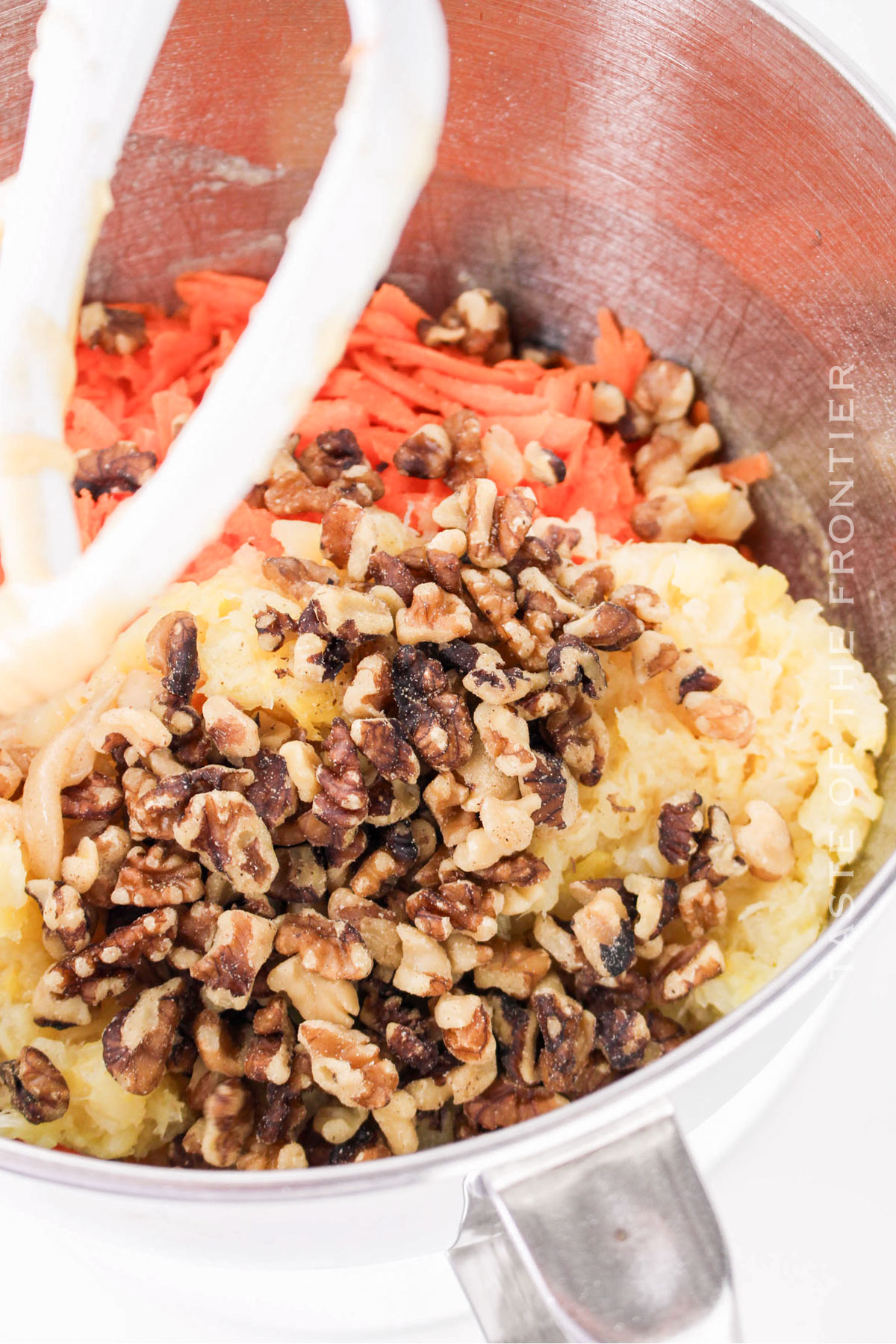 cake batter with carrots and nuts