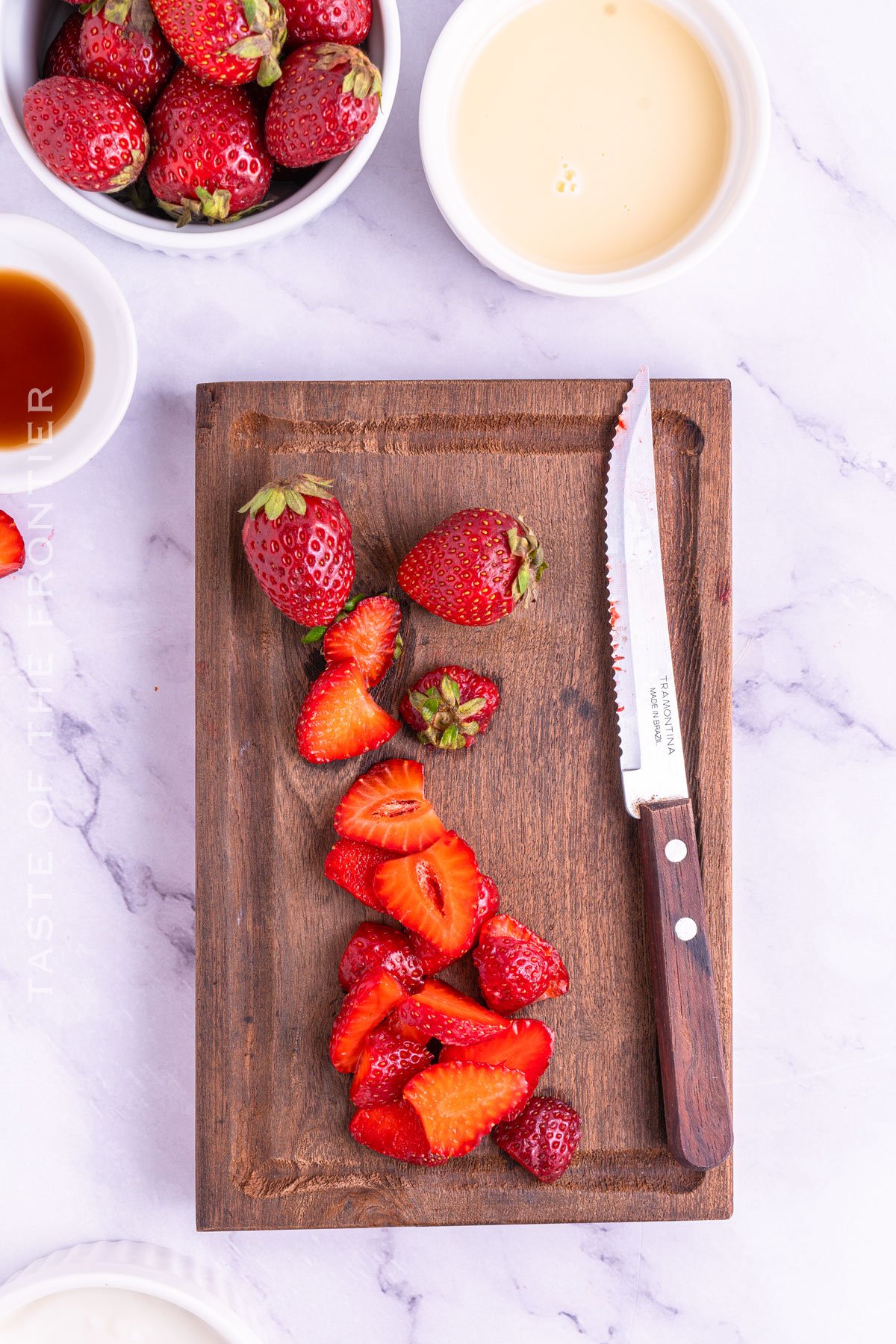 prepping strawberries