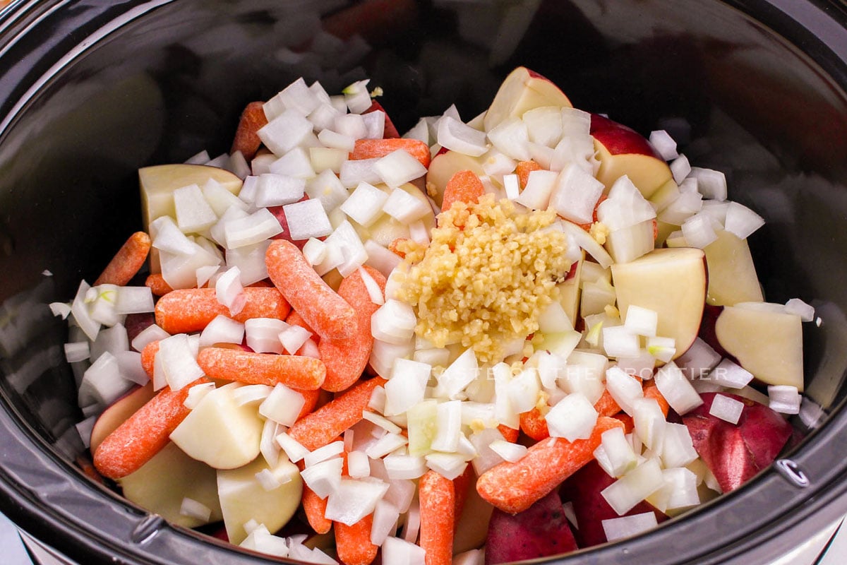 veggies and spices in the crockpot