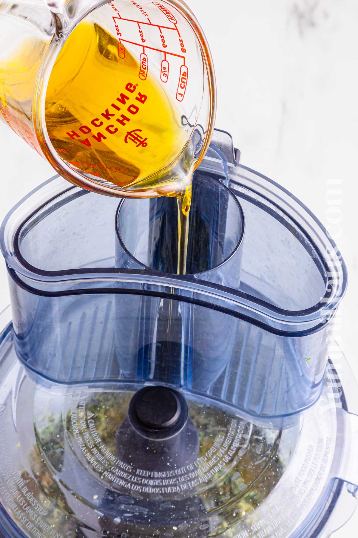 adding the oil