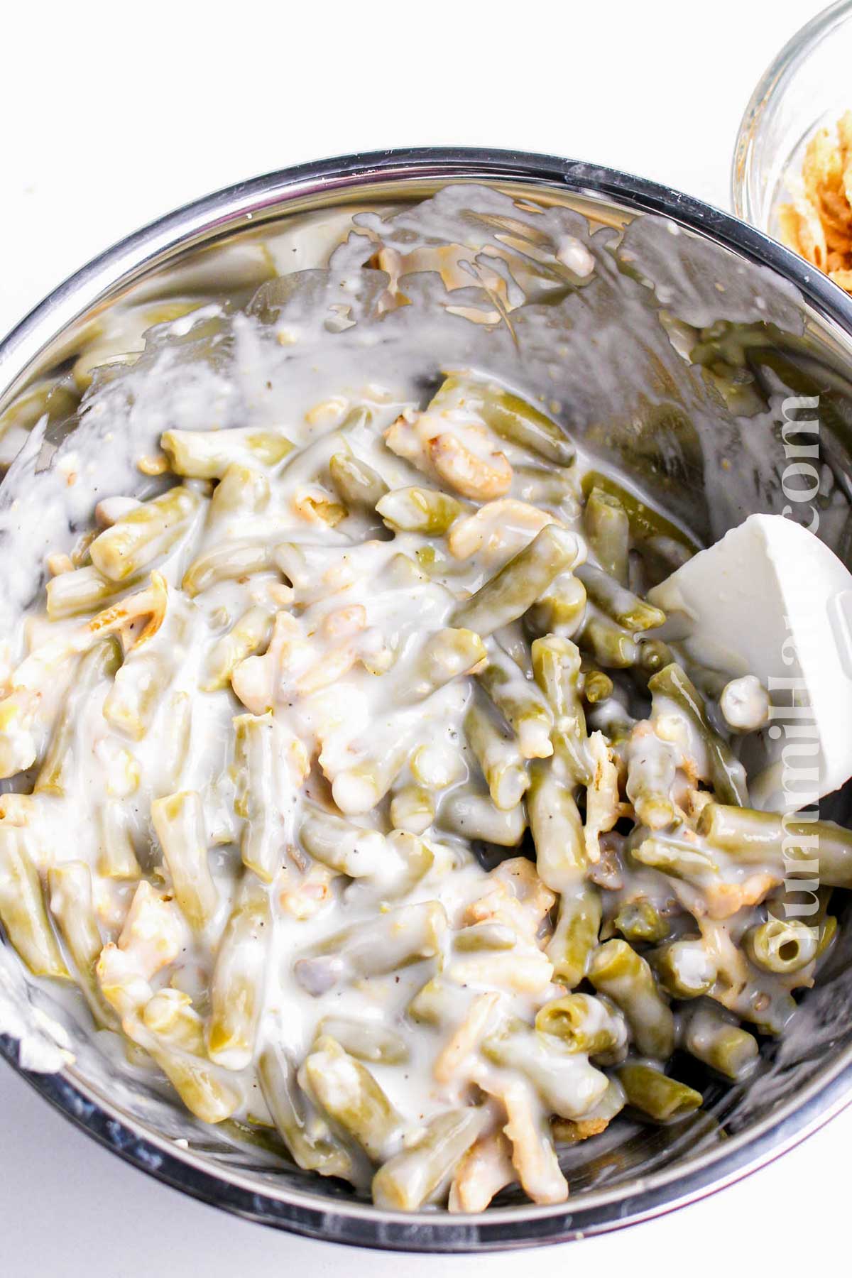 mixing the green beans