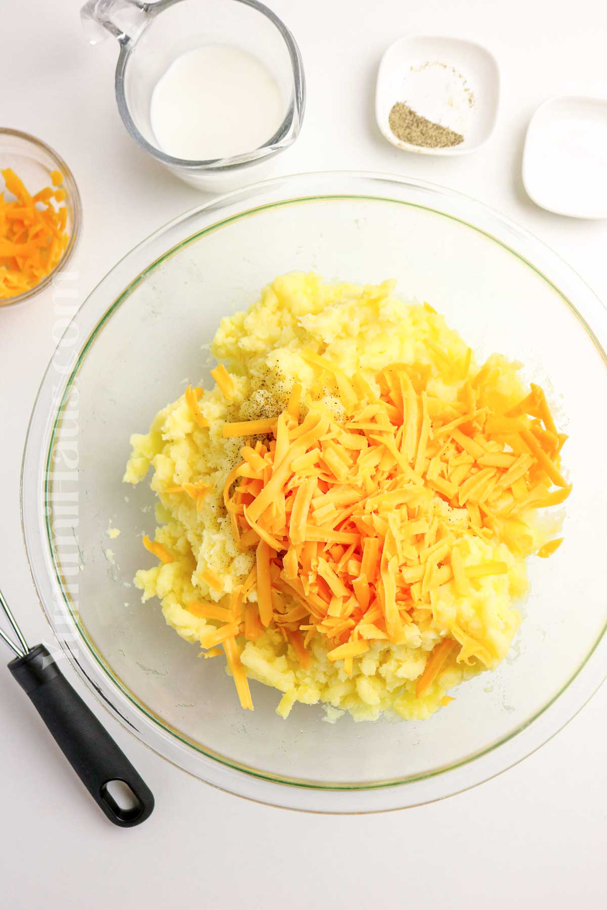 adding cheddar cheese