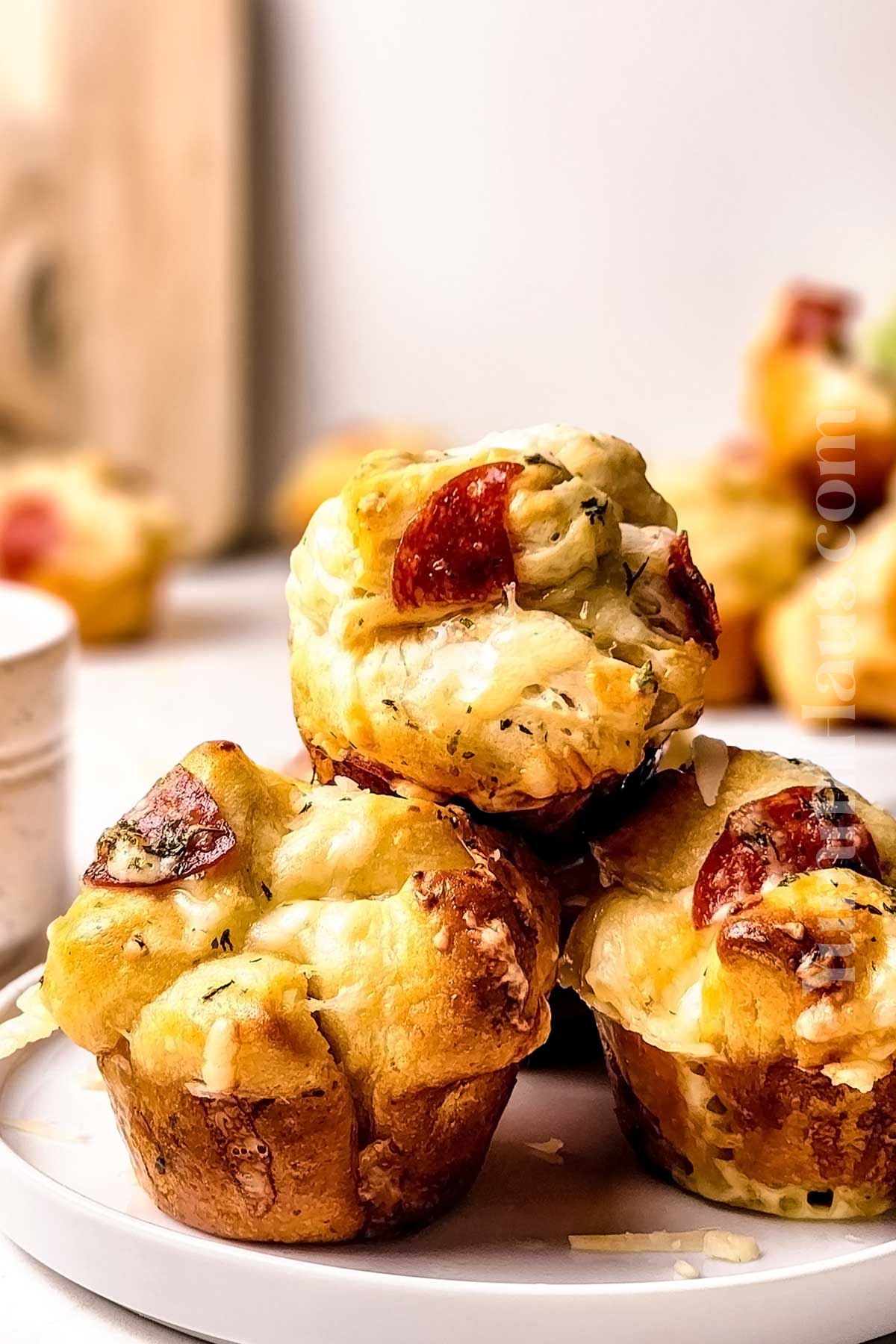 garlic butter on savory muffins