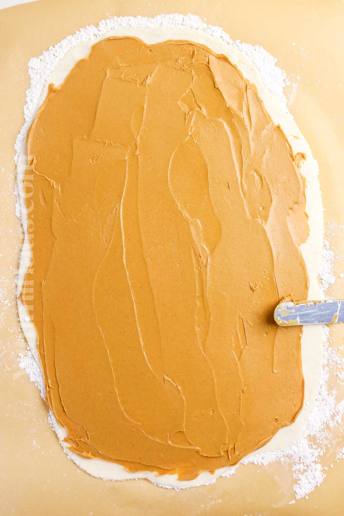 spreading the peanut butter