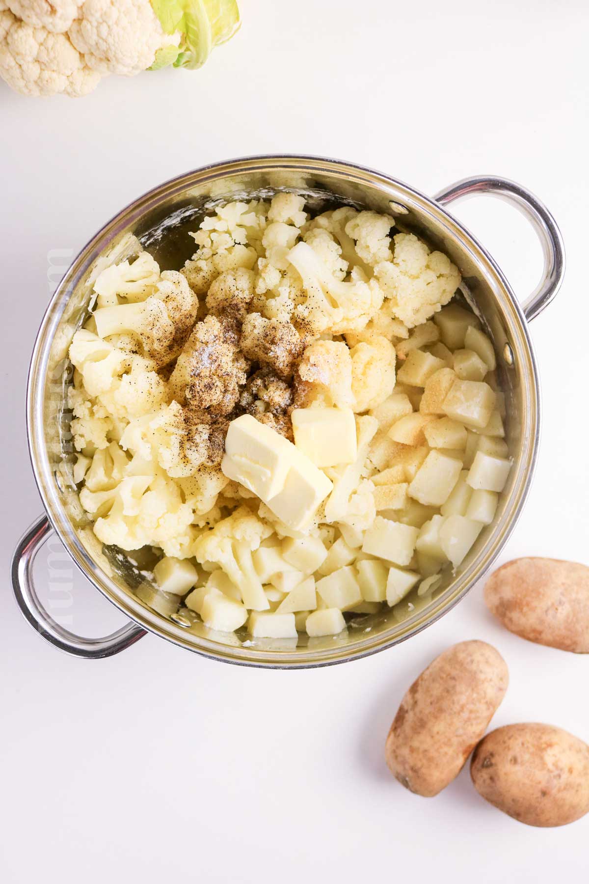 mixing the cooked potatoes