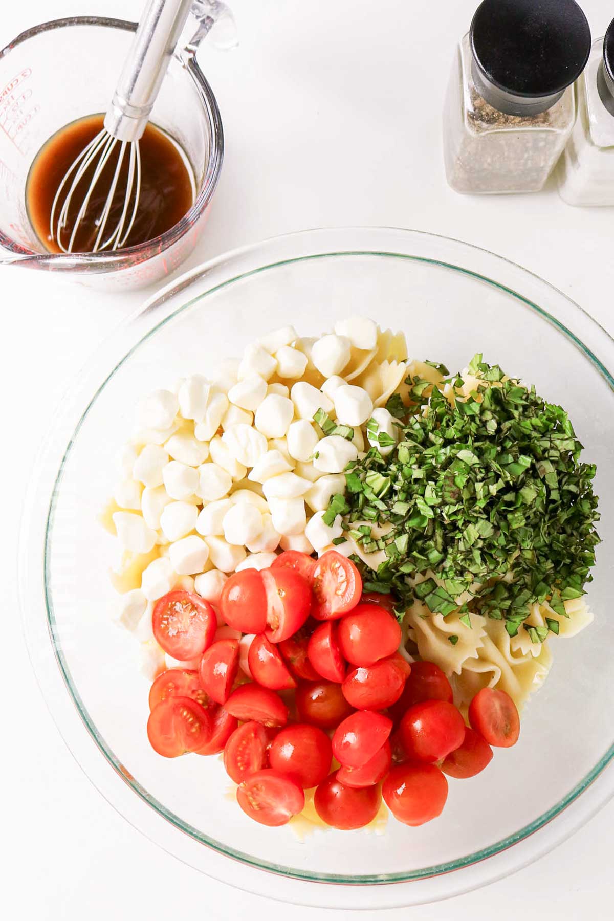 mixing the salad ingredients