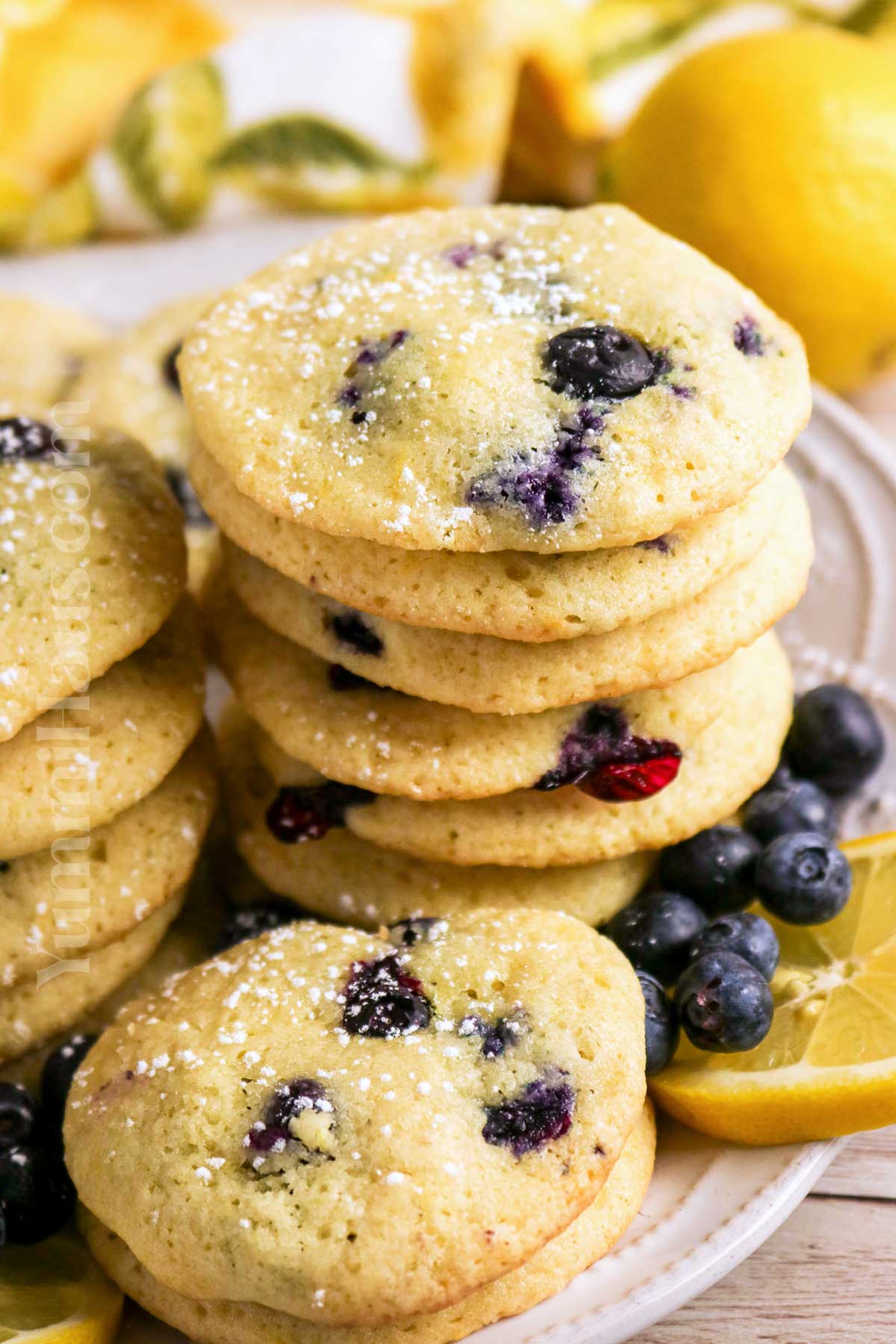 stack of lemon cookies with berries