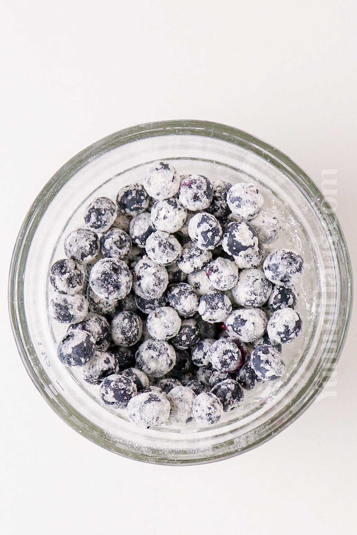 tossing the blueberries