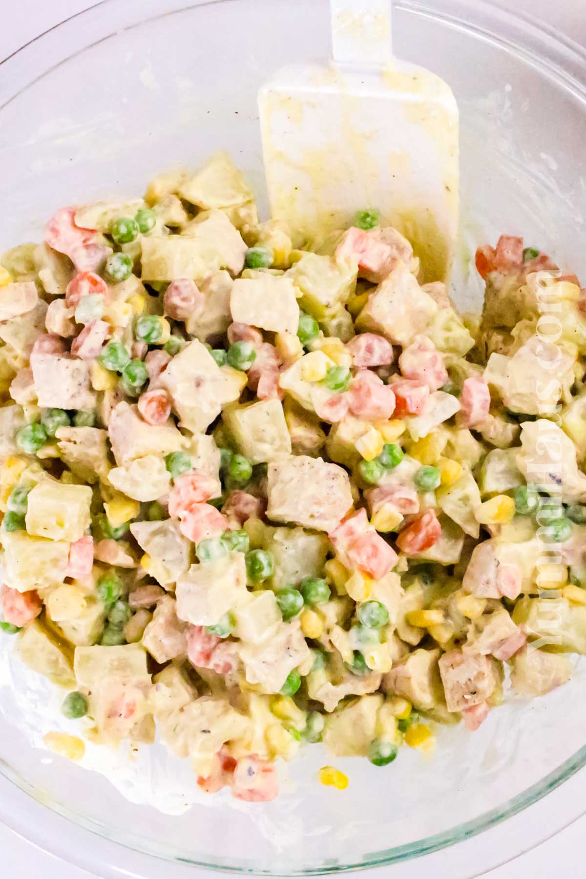 mixing the salad